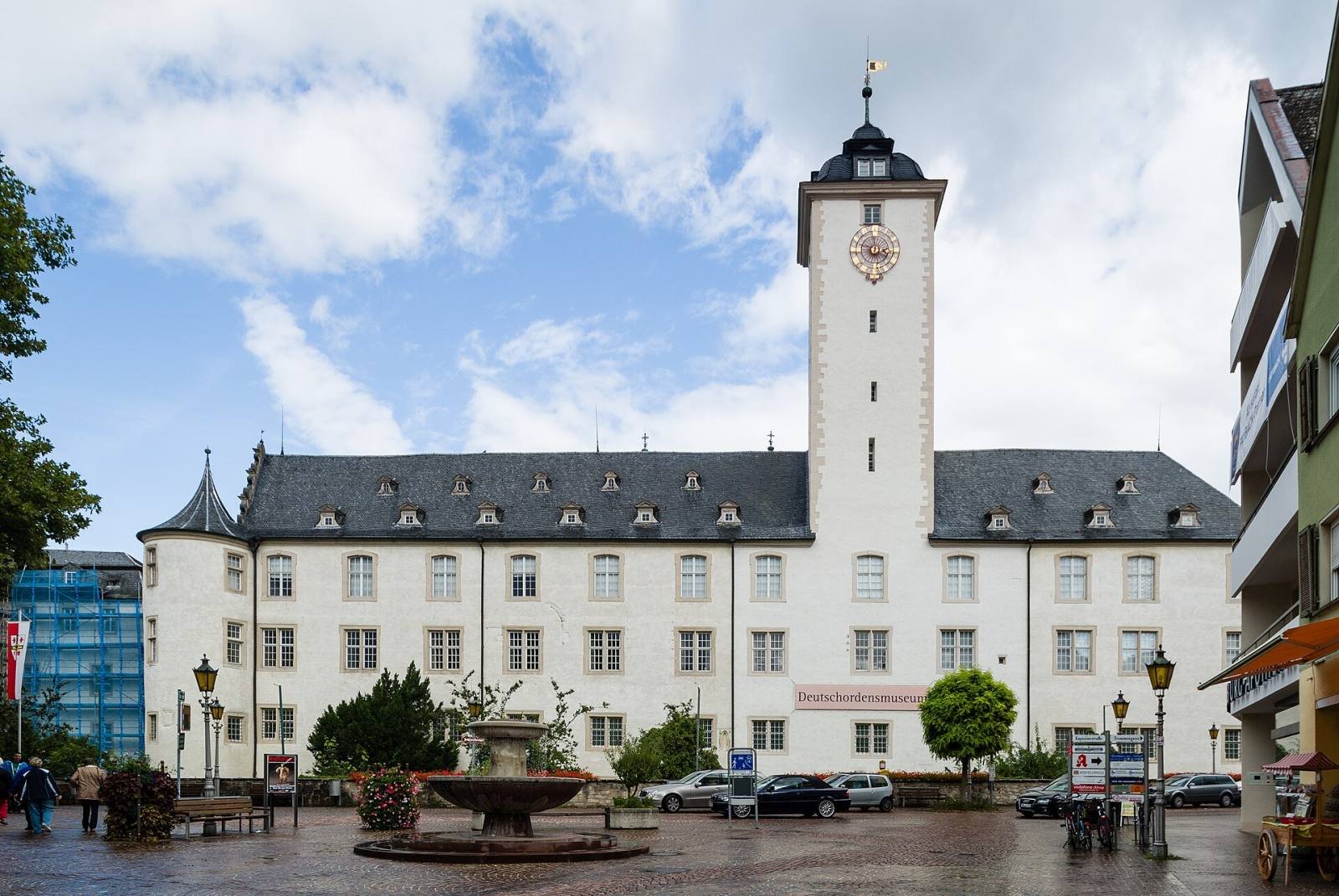 The white palace of the Teutonic Order in Bad Mergentheim with its tall tower above a square